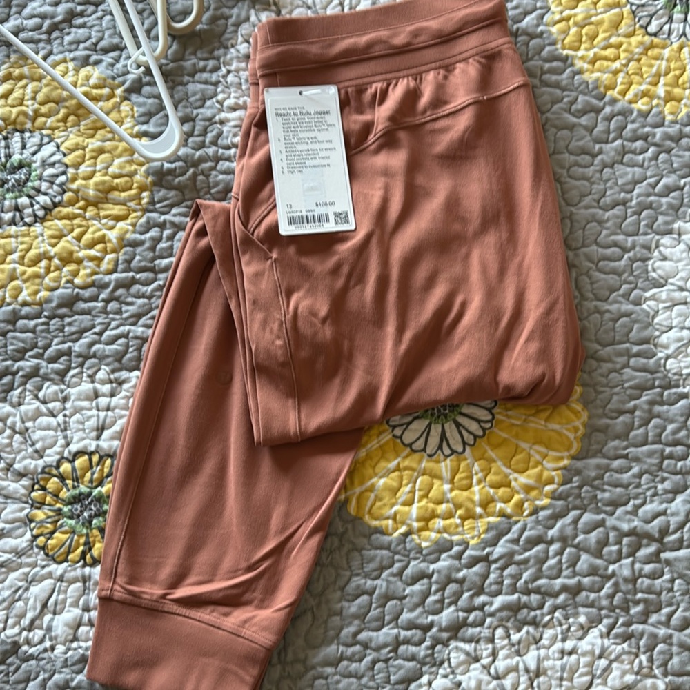 Lululemon Ready to Rulu size 12 Pumpkon colored joggers, tag removed but new!